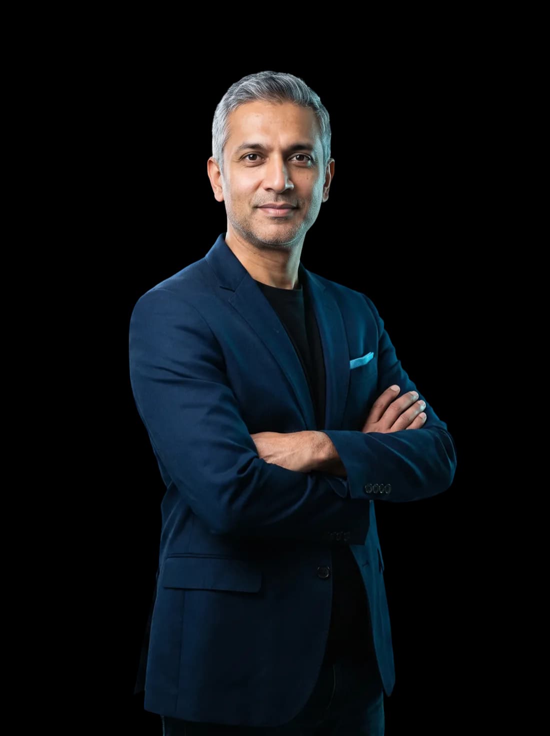 Gen, the managing director of your Genyios AI team, standing with arms crossed